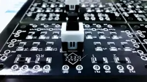 circuit and PCD design by freaky-Deek closeup of a custom designed black PCB for freaky-geeks art sculptures with LED and other electronics.