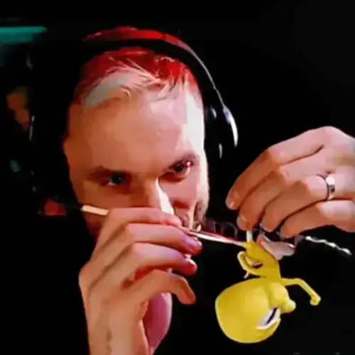 freaky-Deek during sculpting Tweety, a polymer clay handmade cartoon character