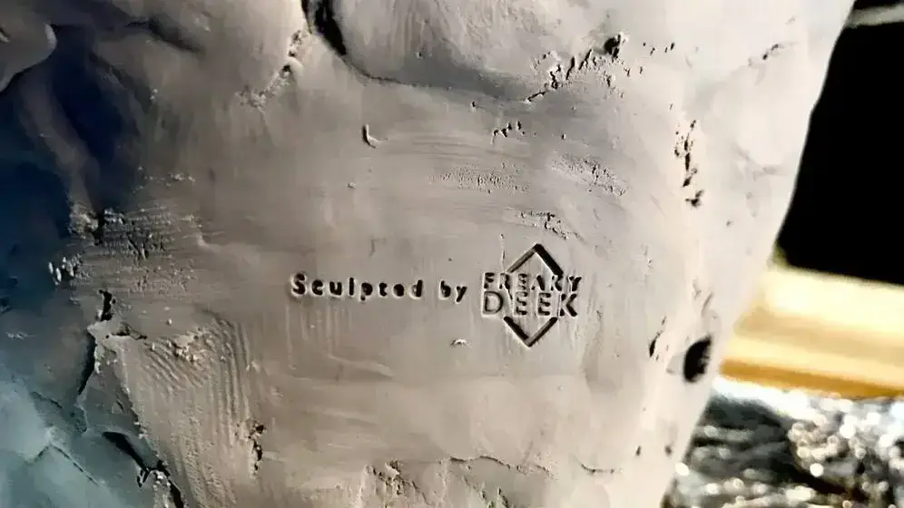 polymer clay sculpture sculpted by freaky-Deek with Logo imprint by hand